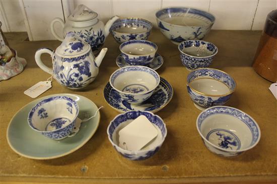 Sundry Oriental blue and white tea wares, inc teapots, bowls, saucers & a celadon dish (damage & repairs)